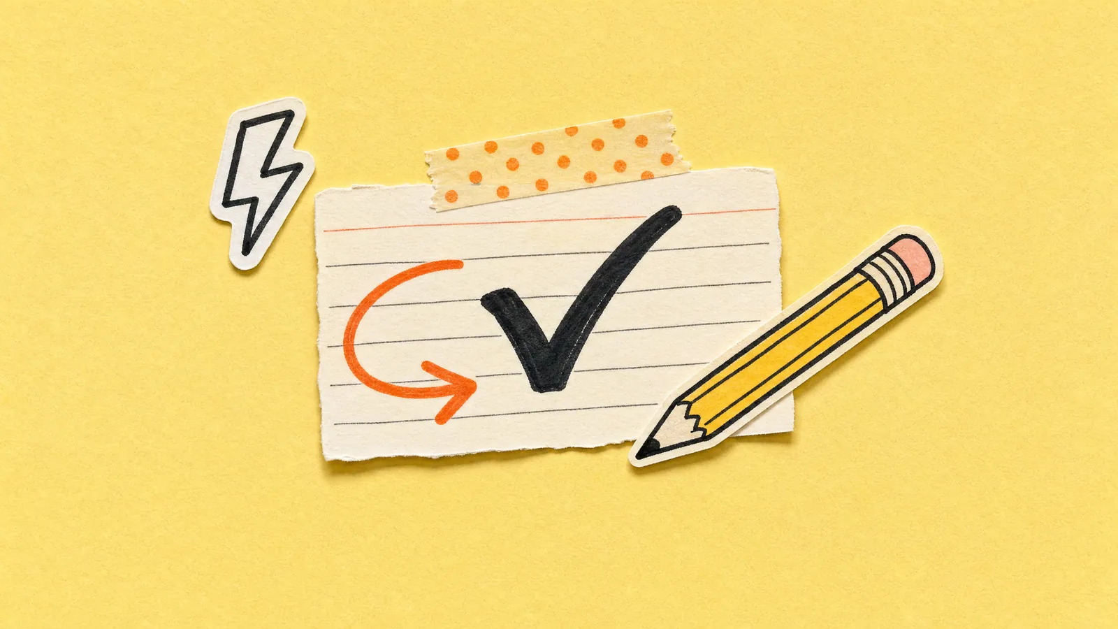 An index card with a big black tick, an orange undo arrow curling back from it and a pencil with its eraser ready, beside a lightning bolt sticker, on marigold paper.